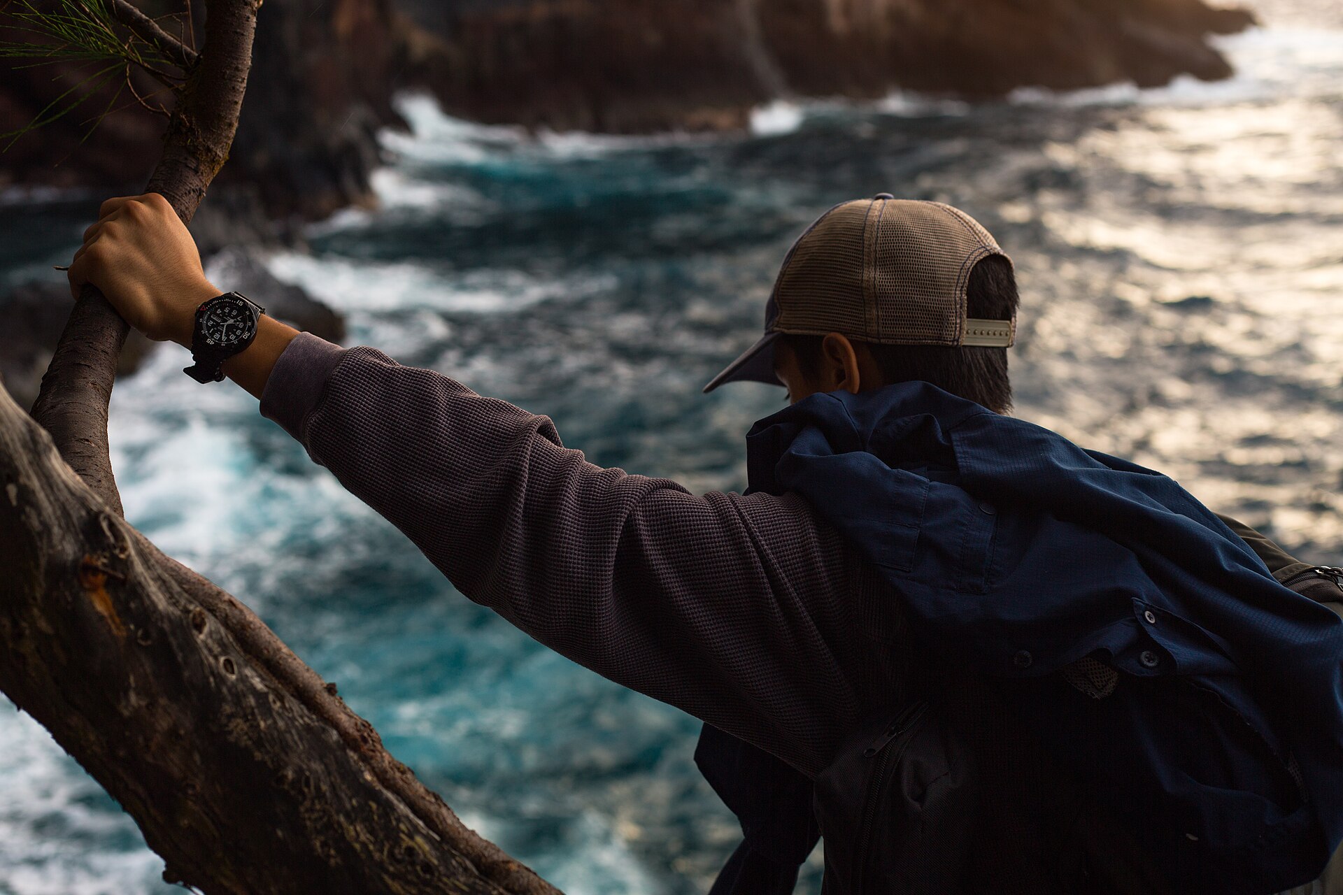 Hiker checking Apple Watch on trail